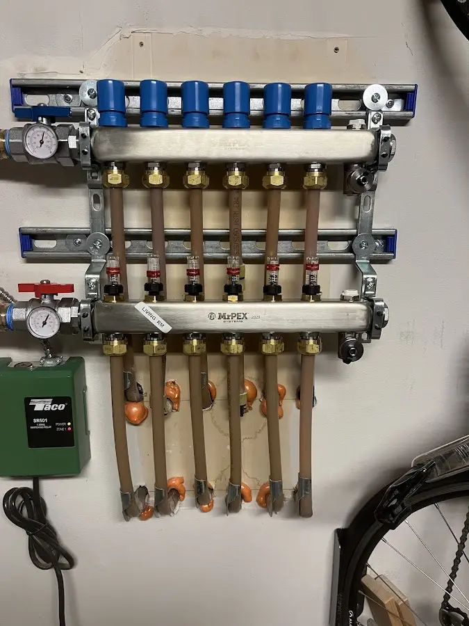 Plumber performing Gas Line Installation at a residential property in Golf Manor